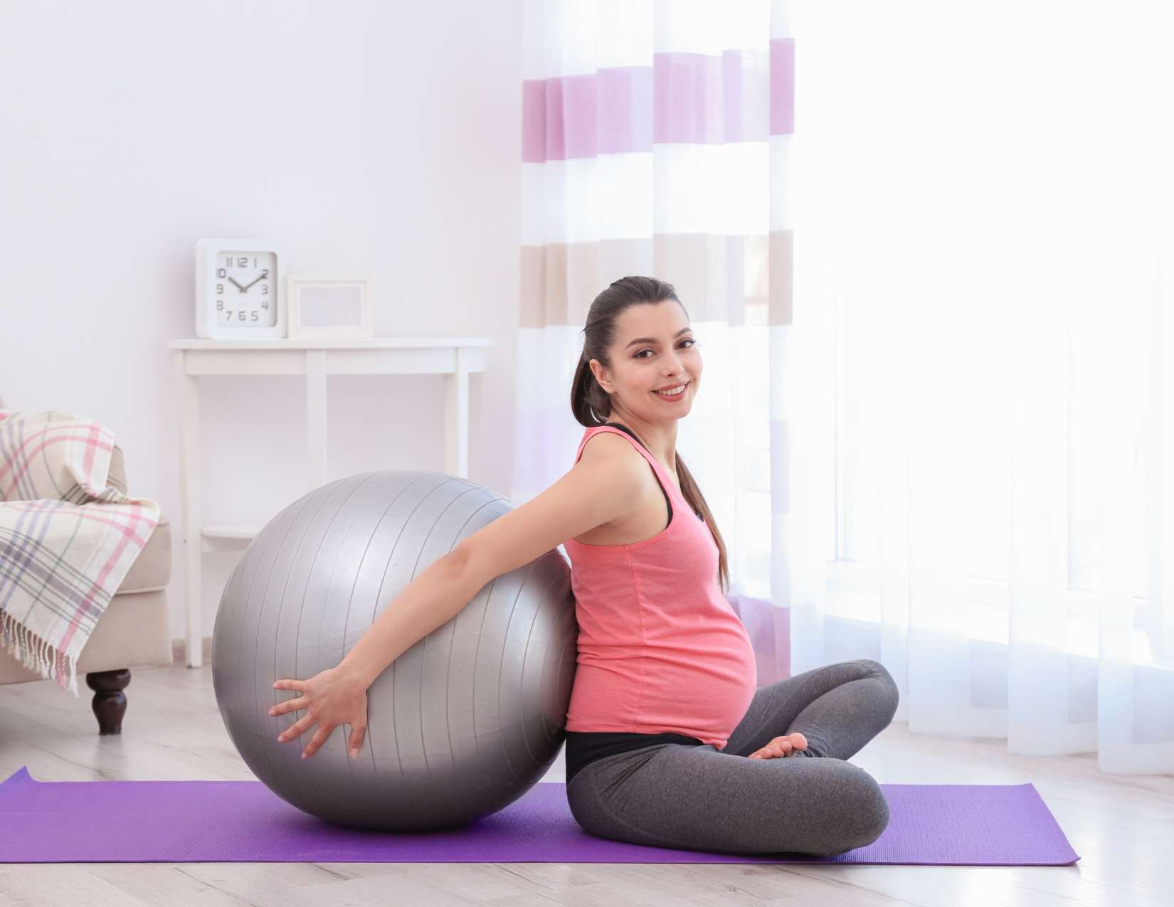 The Best Pregnancy Ball Exercises for Pelvic Pain